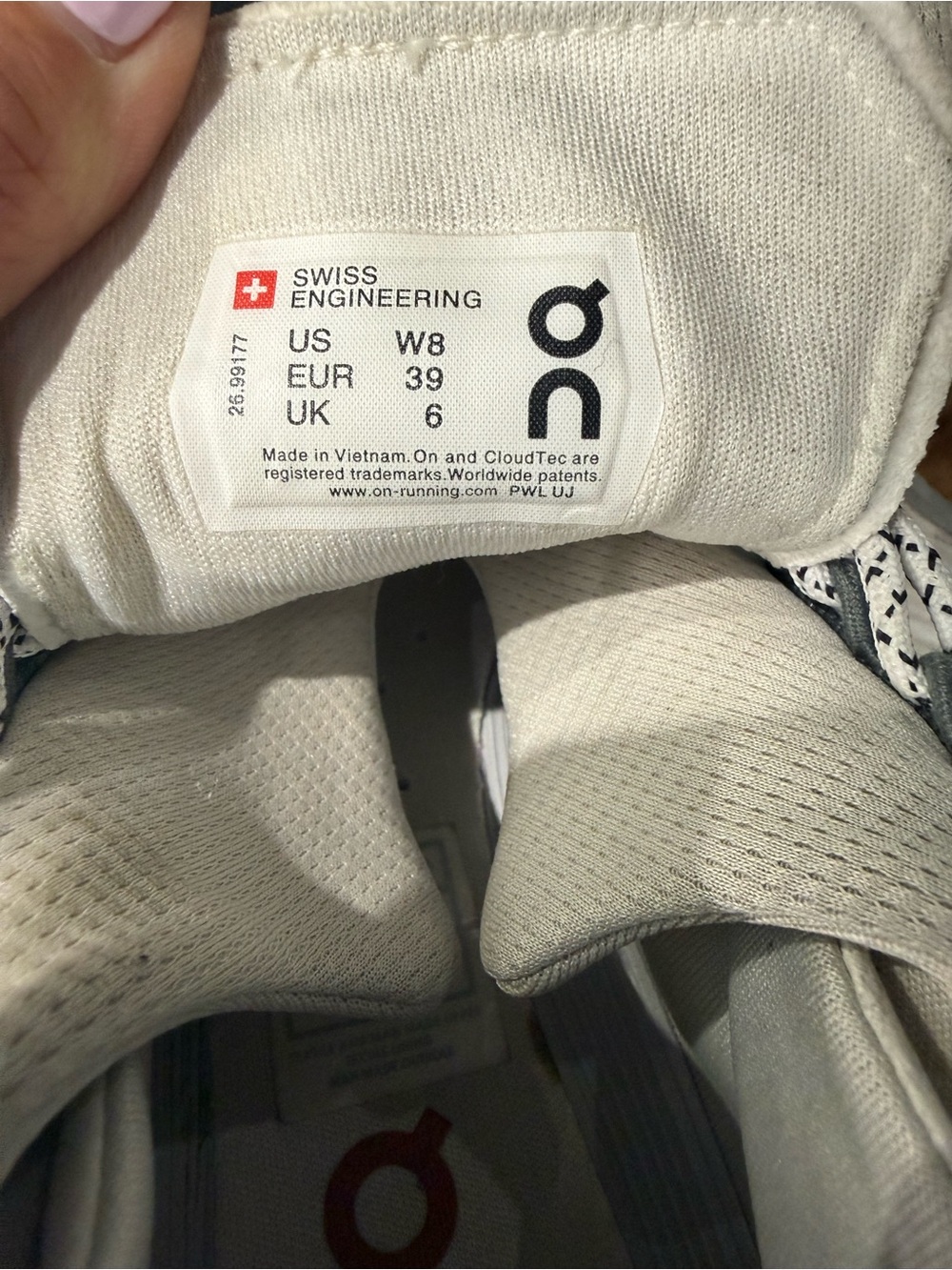 On Running White Sneakers with Tan Accents - Picture 4 of 4